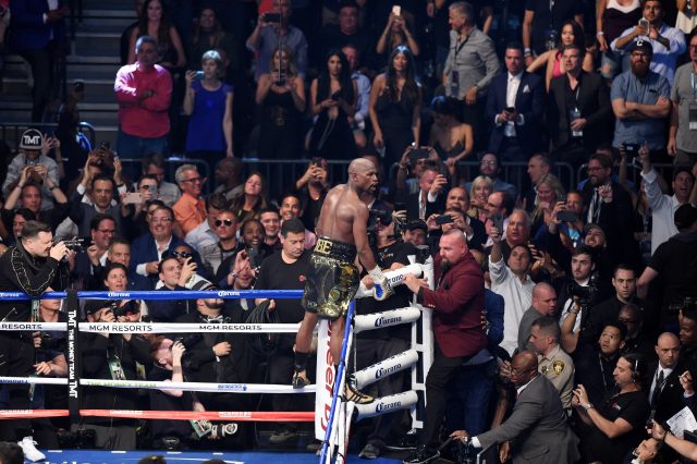 Floyd Mayweather celebrates victory