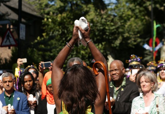 Doves are released as a show of respect for those who died in the Grenfell Tower fire