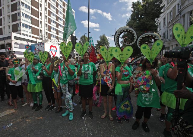 People observe a minute's silence in memory of the victims of the Grenfell Tower fire