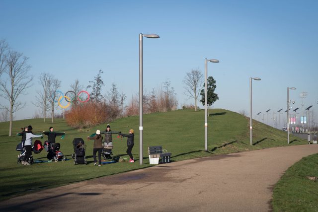 Mothers take part in a group exercise activity at the Queen Elizabeth Olympic Park in London (PA)