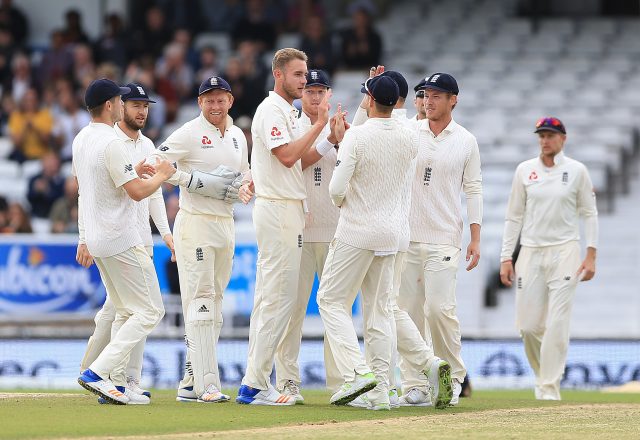 Broad celebrates after taking the wicket of Powell (Nigel French/PA)