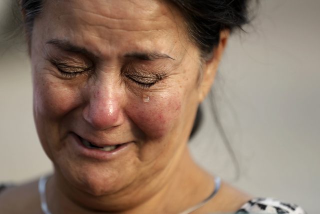 Frances Breaux cries as she talks about her fears for two close friends who live near the Arkema Inc. chemical plant (Gregory Bull/AP)