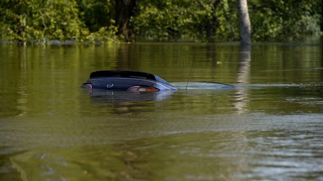 A car is submerged due to Tropical Storm Harvey in the north end of Beaumont