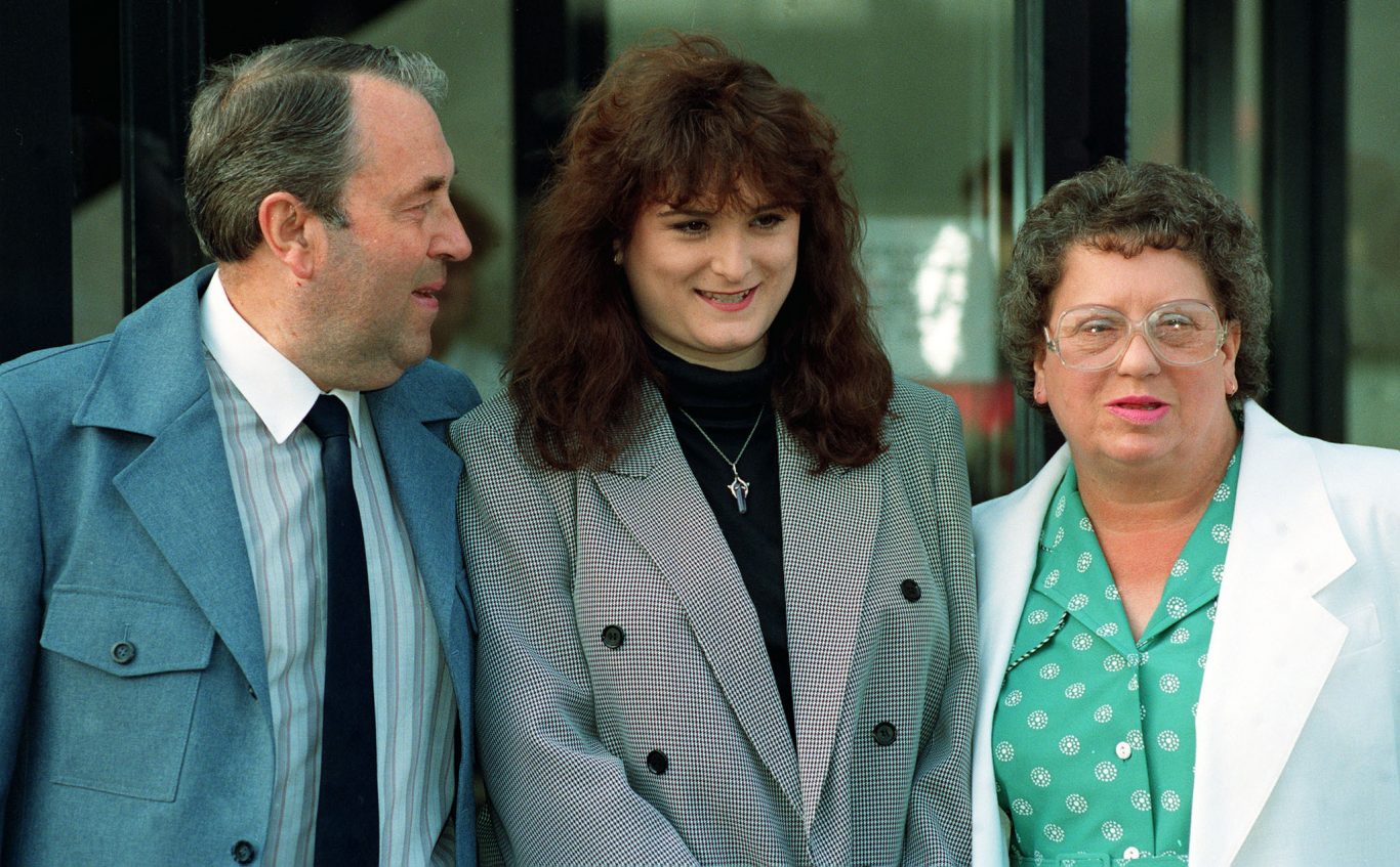 Stephanie Slater flanked by her parents Warren and Betty  (David Jones/PA)