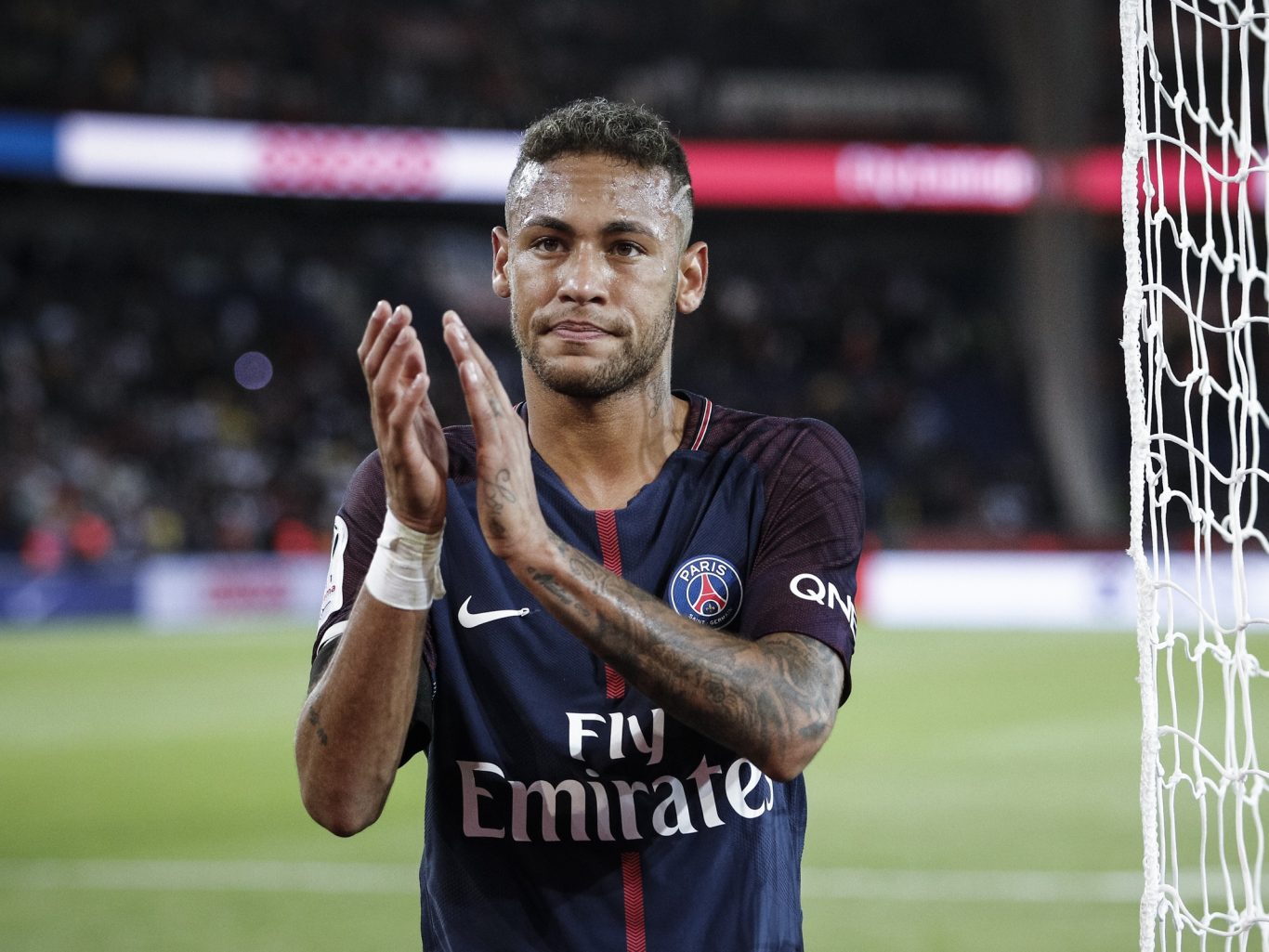 Paris St Germain's world-record signing of Neymar was not enough to push Ligue 1 spending anywhere near Premier League levels (Kamil Zihnioglu/AP)