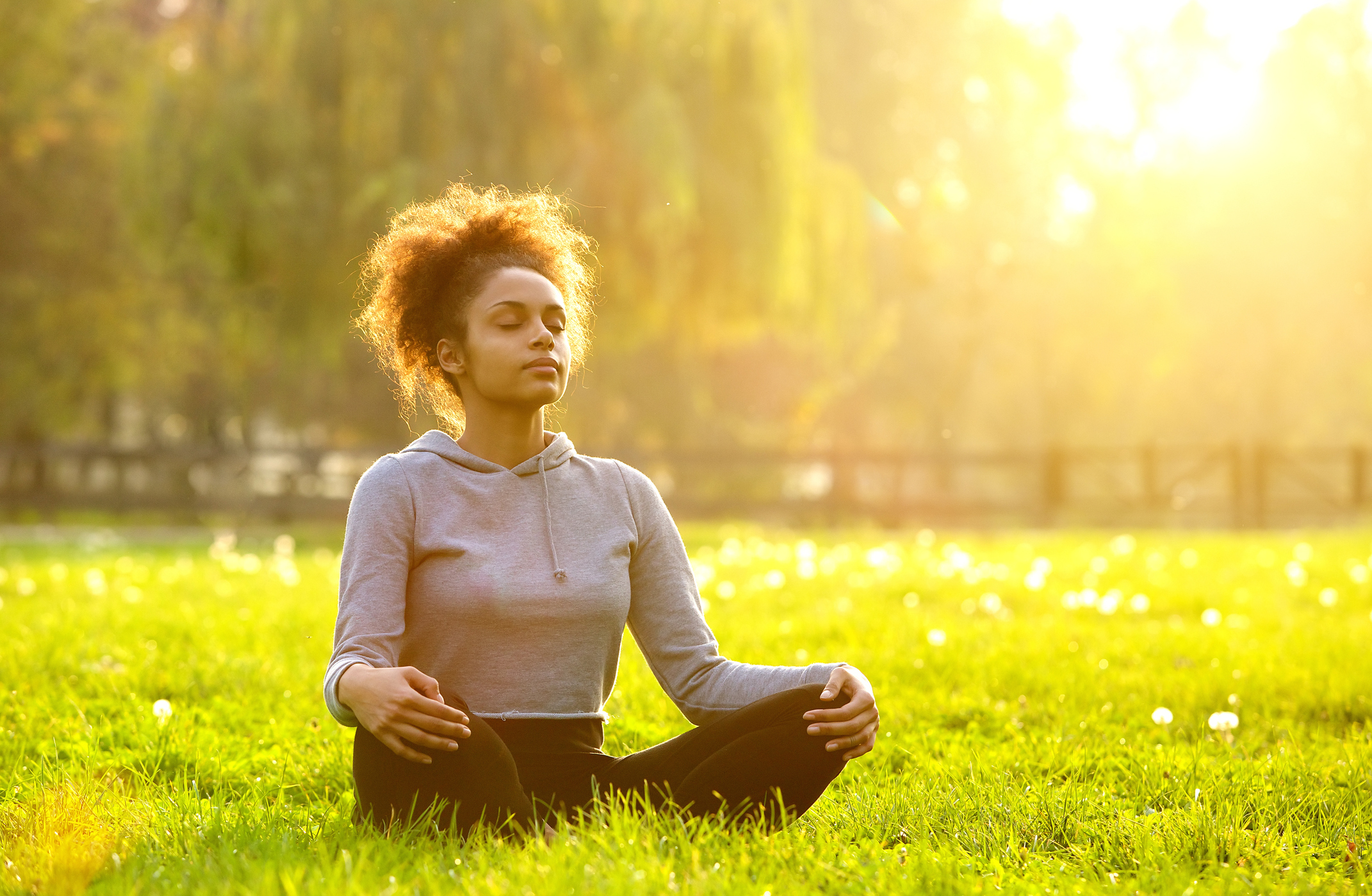 Generic photo of woman meditating outdoors (Thinkstock/PA)