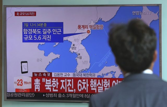 A man watches a TV news report about a possible nuclear test conducted by North Korea. (AP)