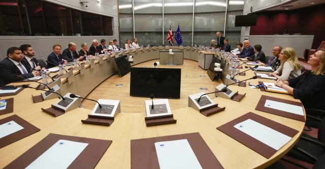 The negotiating teams. (Olivier Hoslet/AP/PA)