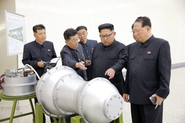 Kim Jong Un inspects the loading of a hydrogen bomb into a new intercontinental ballistic missile. (AP)