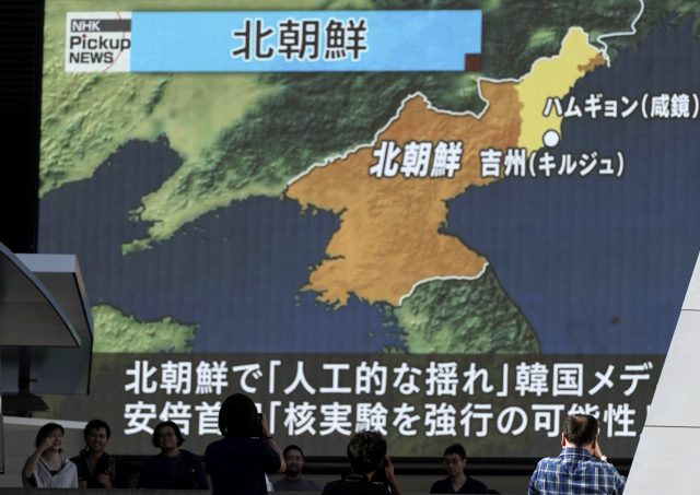 Japanese TV coverage of the launch. (AP)