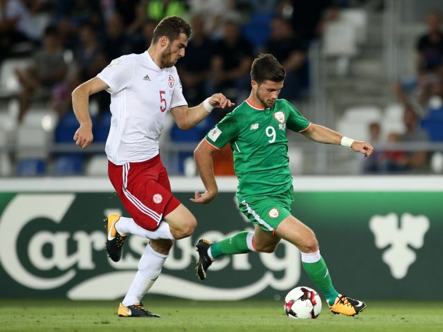 Georgia's Solomon Kverkvelia (left) and Republic of Ireland's Shane Long battle for the ball during the 2018 FIFA World Cup Qualifying match