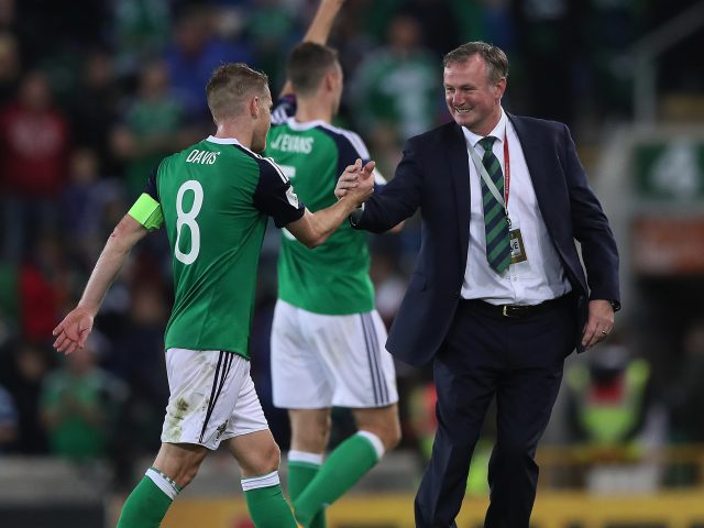 Northern Ireland manager Michael O'Neill celebrates with Steven Davis after the 2018 FIFA World Cup Qualifying match with Czech Republic