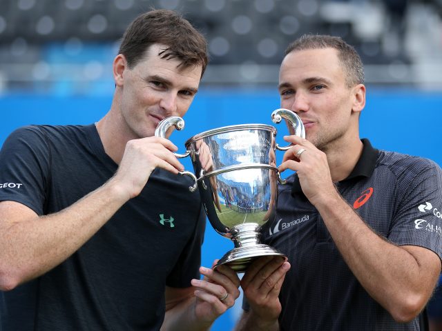 Great Britain's Jamie Murray and Brazil's Bruno Soares celebrate with the trophy after winning the doubles final of the 2017 AEGON Championship