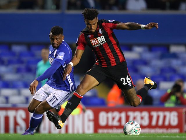 Birmingham City's Isaac Vassell (left) and AFC Bournemouth's Tyrone Mings during the Carabao Cup