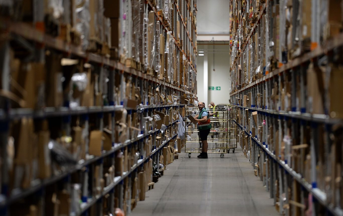 A worker in the Sports Direct warehouse in Shirebrook, Nottinghamshire, as the company held an open day coinciding with its annual general meeting (Joe Giddens/PA)