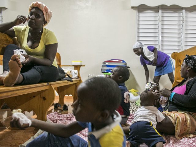 Families shelter in a church in Las Terrenas, Dominican Republic
