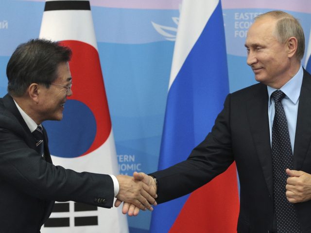 Moon Jae-in greets Vladimir Putin in Vladivostok, Russia 