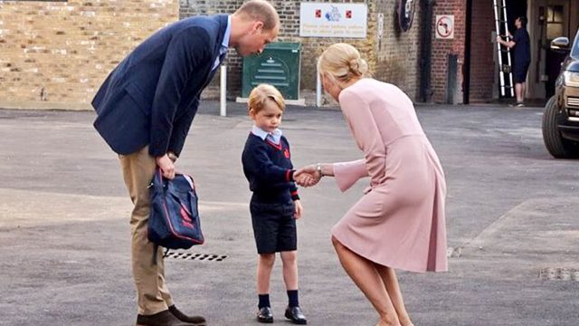 Prince George is welcomed to Thomas's Battersea by the head of the lower school Helen Haslem