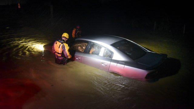 A car is caught up in the destruction caused by Hurricane Irma