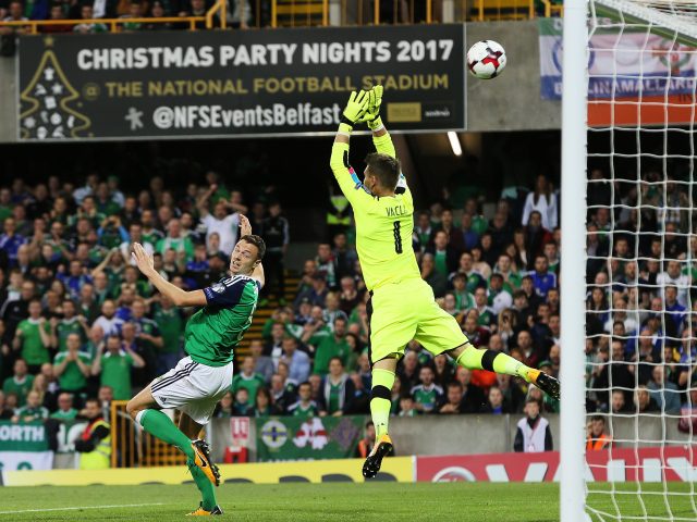 Northern Ireland's Jonny Evans scores his side's first goal during the 2018 FIFA World Cup Qualifying at Windsor Park