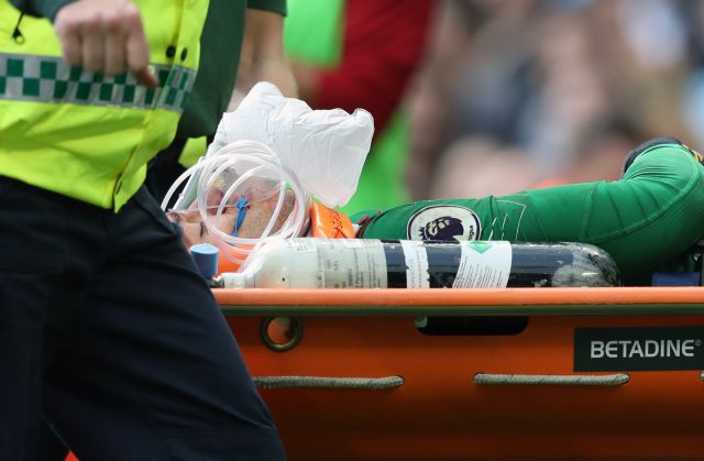 Manchester City goalkeeper Ederson is stretchered off