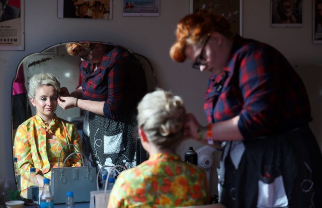 A woman has her hair done at a salon during the Goodwood Revival (Andrew Matthews/PA)