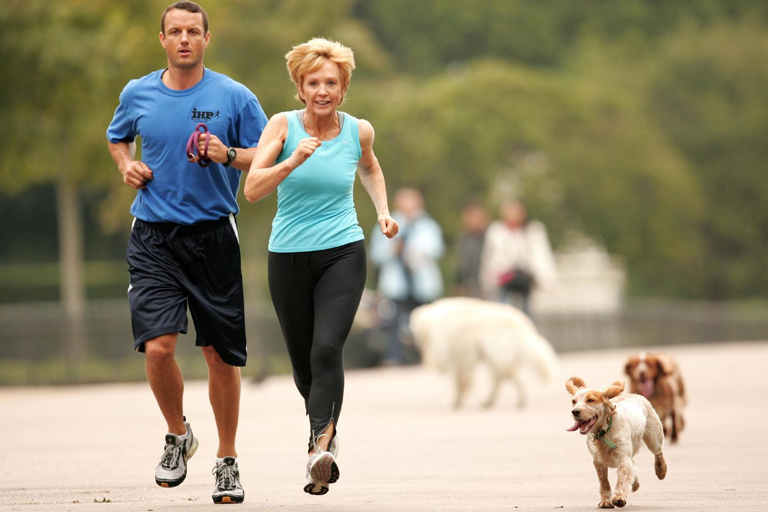 Anne Robinson, jogging with her personal trainer and dog (2007) (Terry Richards/PA)