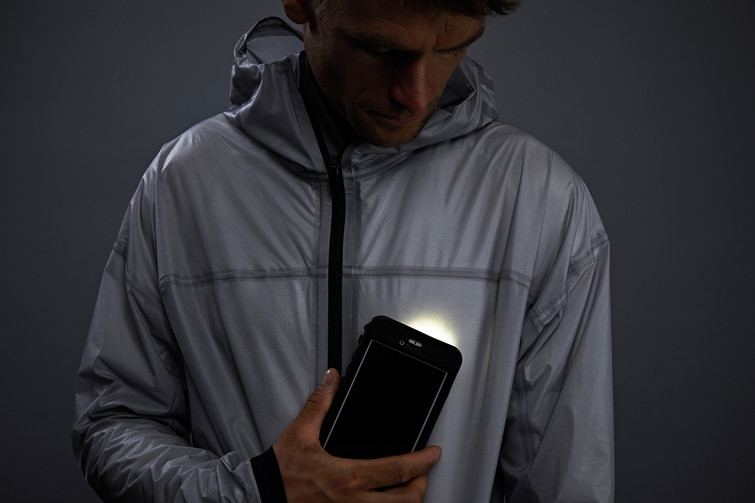 A smartphone is used to power The Solar Charged Jacket from Vollebak (Sun Lee/Vollebak)