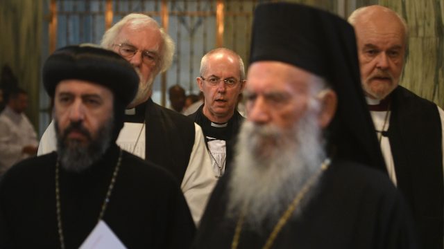 Representatives of other Christian churches took part in a procession down the aisle as the mass began