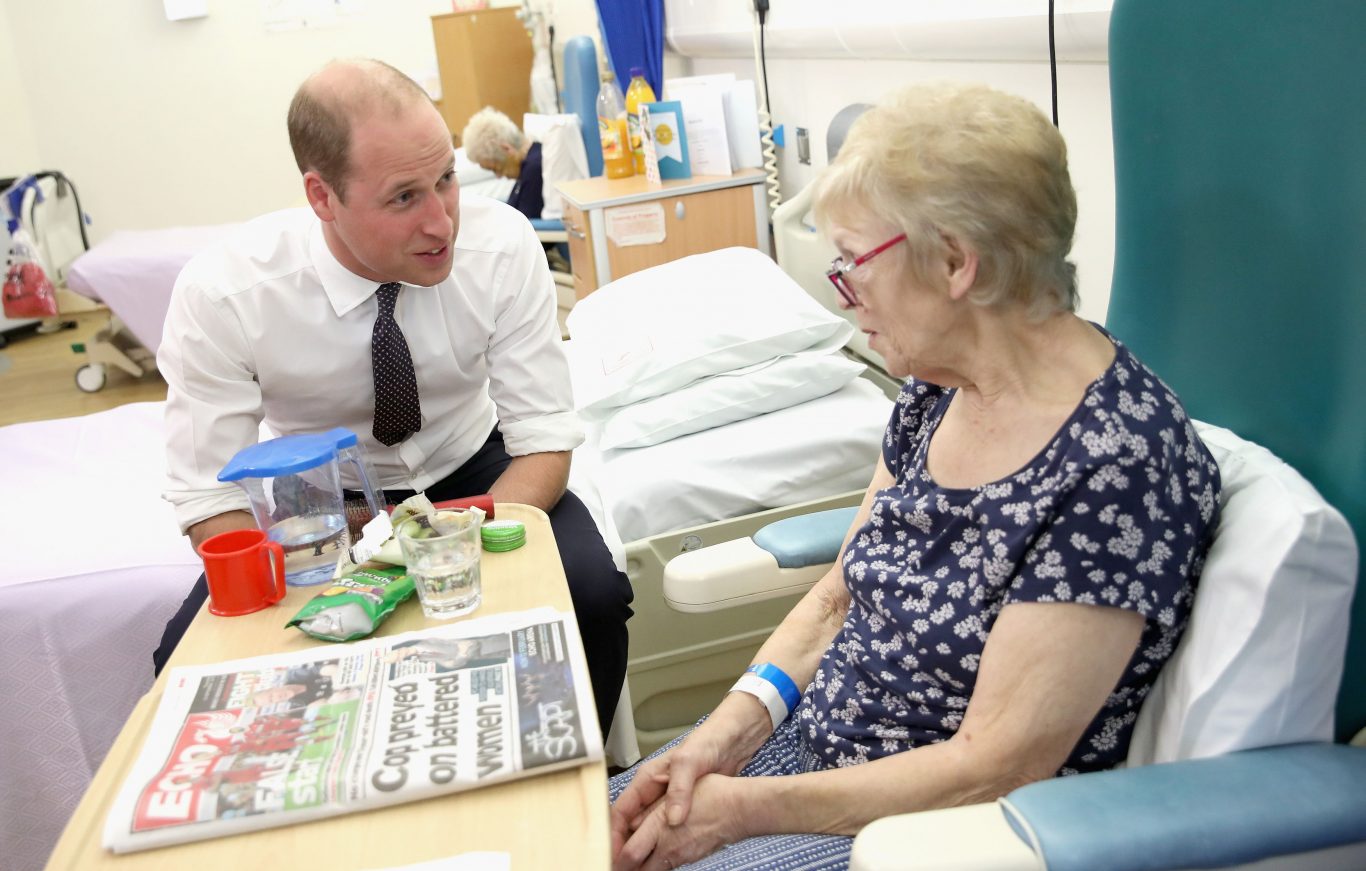 The Duke of Cambridge chats with patient Edna Dagnall in the Frailty unit during his visit to Aintree University Hospital (Chris Jackson/PA)