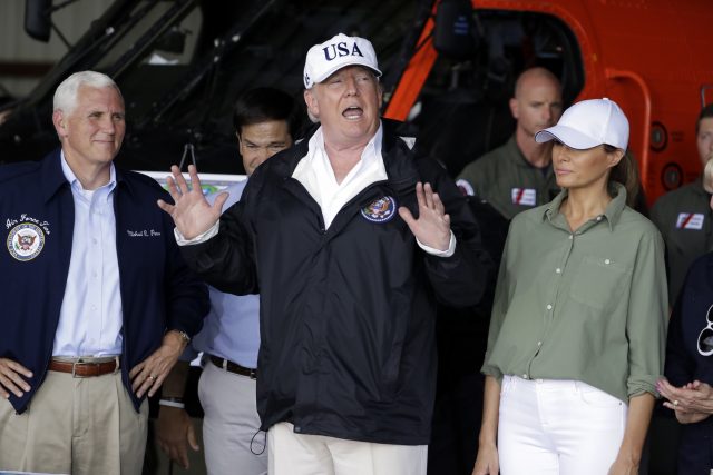 President Donald Trump, first lady Melania Trump, right, and from left, Vice President Mike Pence and Senator Marco Rubio participate in a briefing on the Hurricane Irma relief efforts in Fort Myers, Florida, after arriving at Southwest Florida International airport (AP Photo/Evan Vucci)