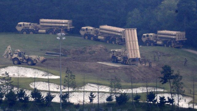 U.S. missile defense system called Terminal High-Altitude Area Defense system, or THAAD, are seen at a golf course in Seongju