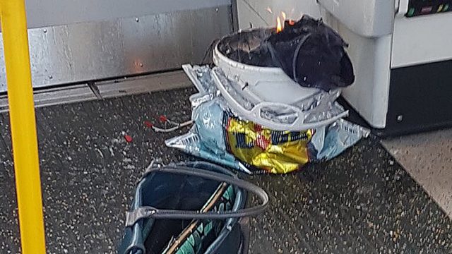 A bucket on fire on a tube train at Parsons Green station in west London amid reports of an explosion