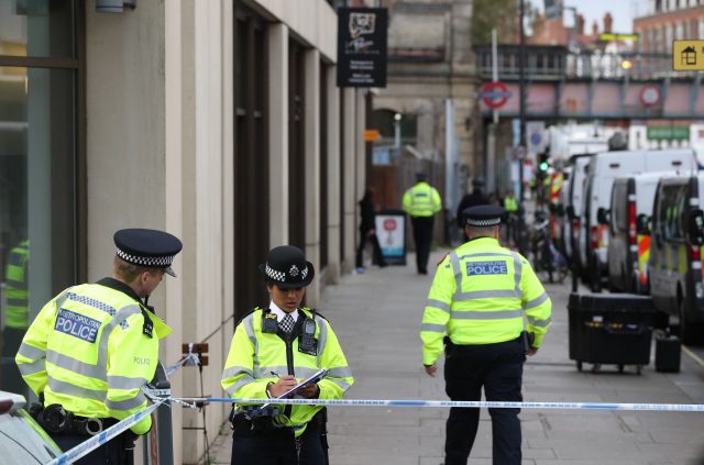 Police outside Parsons Green station in west London as a manhunt has been launched after a bomb was detonated in a terror attack on a packed London Underground train (Jonathan Brady/PA)
