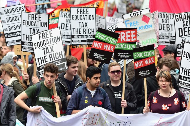 Students protest against the fees. (Dominic Lipinski/PA)