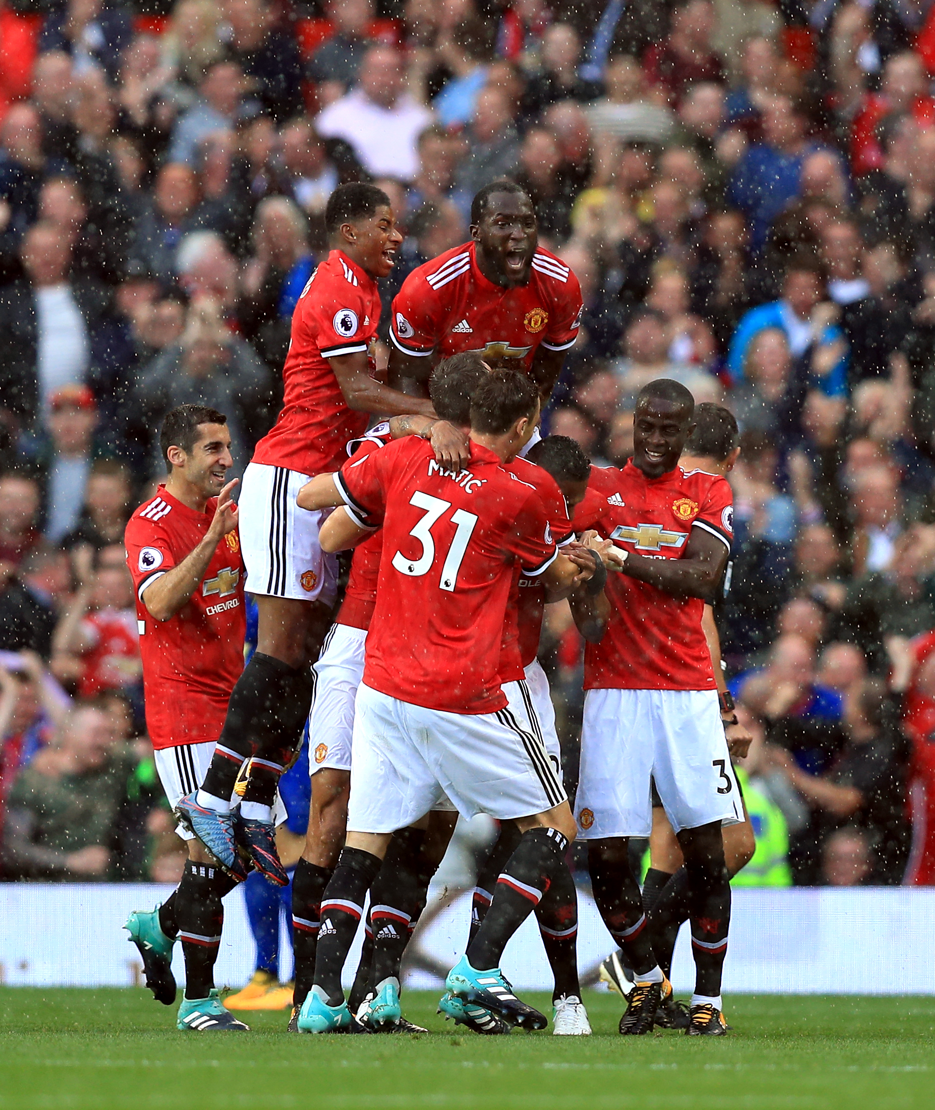 Manchester United's Antonio Valencia celebrates scoring his side's first goal of the game with his team-mates