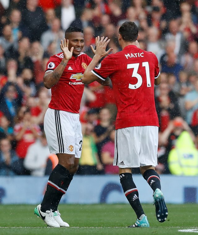 Antonio Valencia, left, celebrates with Nemanja Matic