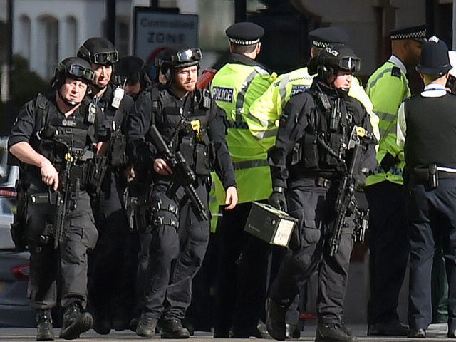 Armed police near Parsons Green station following Friday's attack 