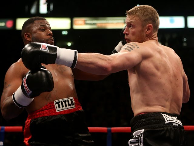 Andrew Flintoff (right) and Richard Dawson in action during the International Heavyweight Contest at the Manchester Arena