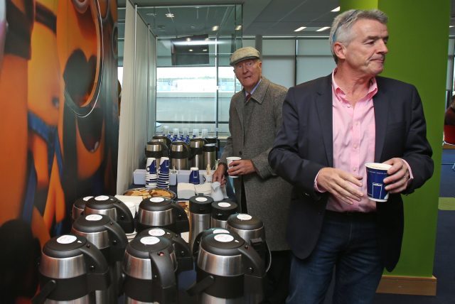 Ryanair boss Michael O'Leary and an unnamed shareholder during the company's AGM at the their Dublin headquarters (Niall Carson/PA)