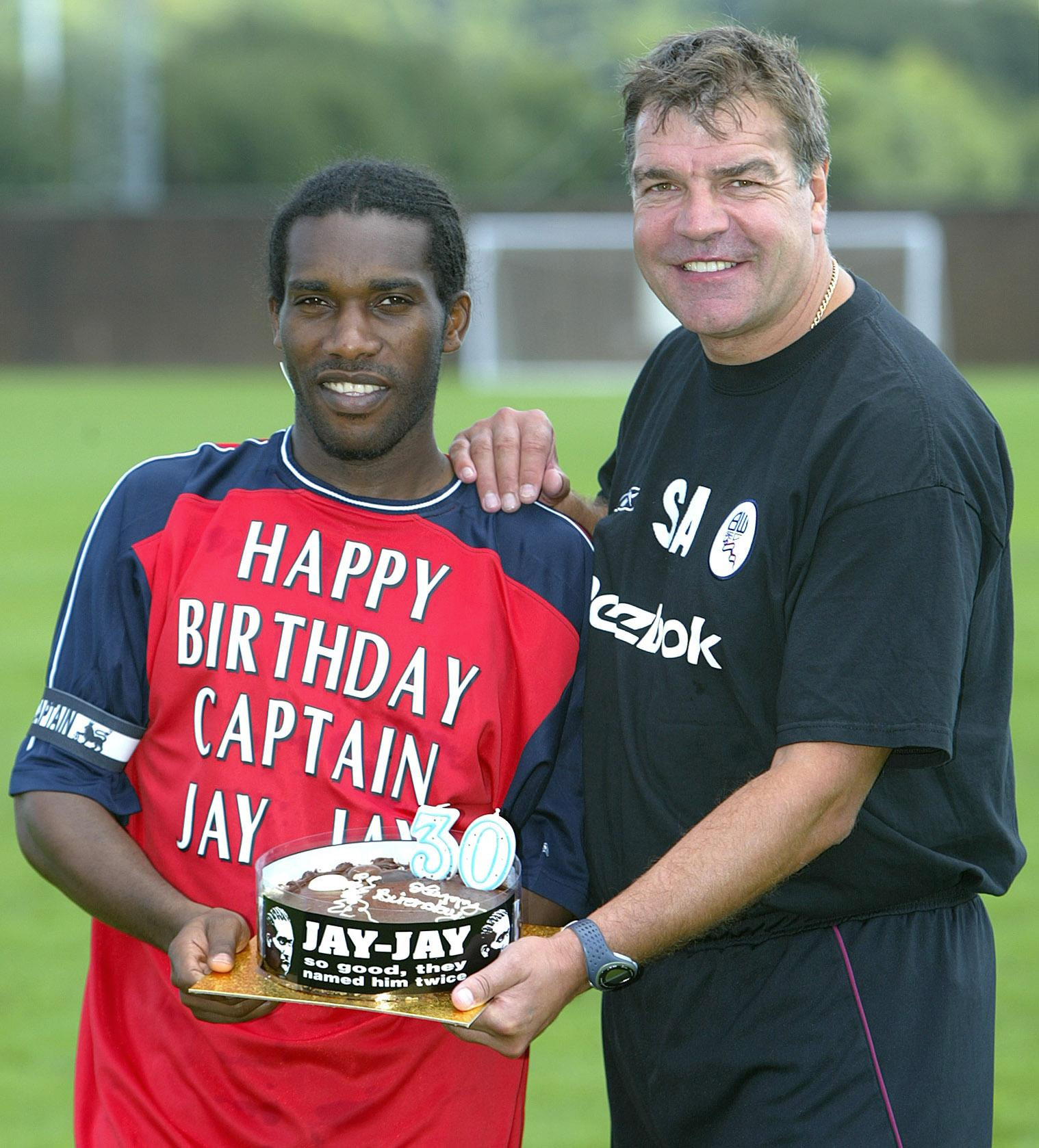 Bolton Wanderers' Jay-Jay Okocha is presented with a birthday cake