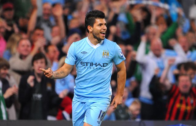 Aguero celebrates scoring his second and his side's third against Swansea(Joe Giddens/Empics)