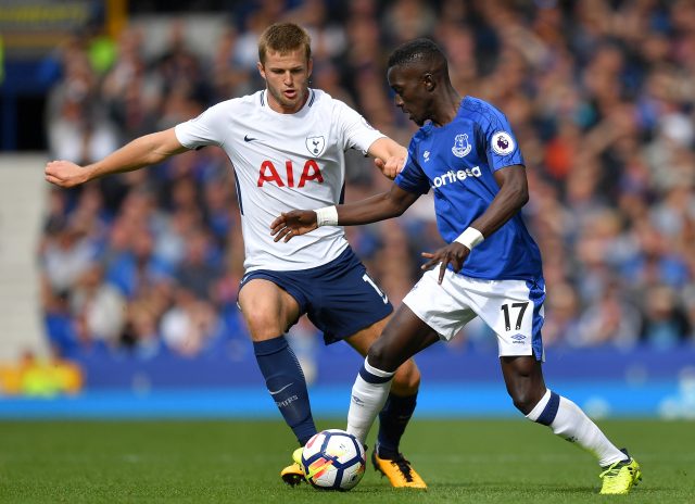 Eric Dier challenges  Idrissa Gueye 