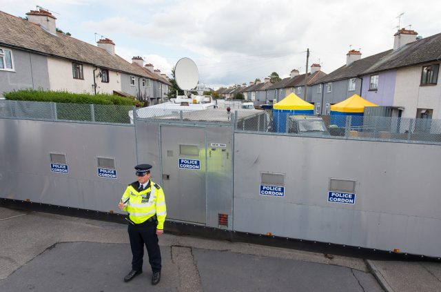 Police at a cordon on Cavendish Road, in Sunbury-on-Thames. (PA)