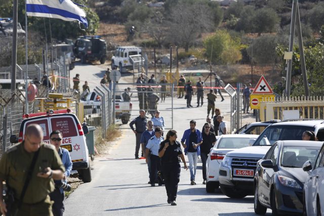 Israeli security at an entrance to the Har Adar settlement