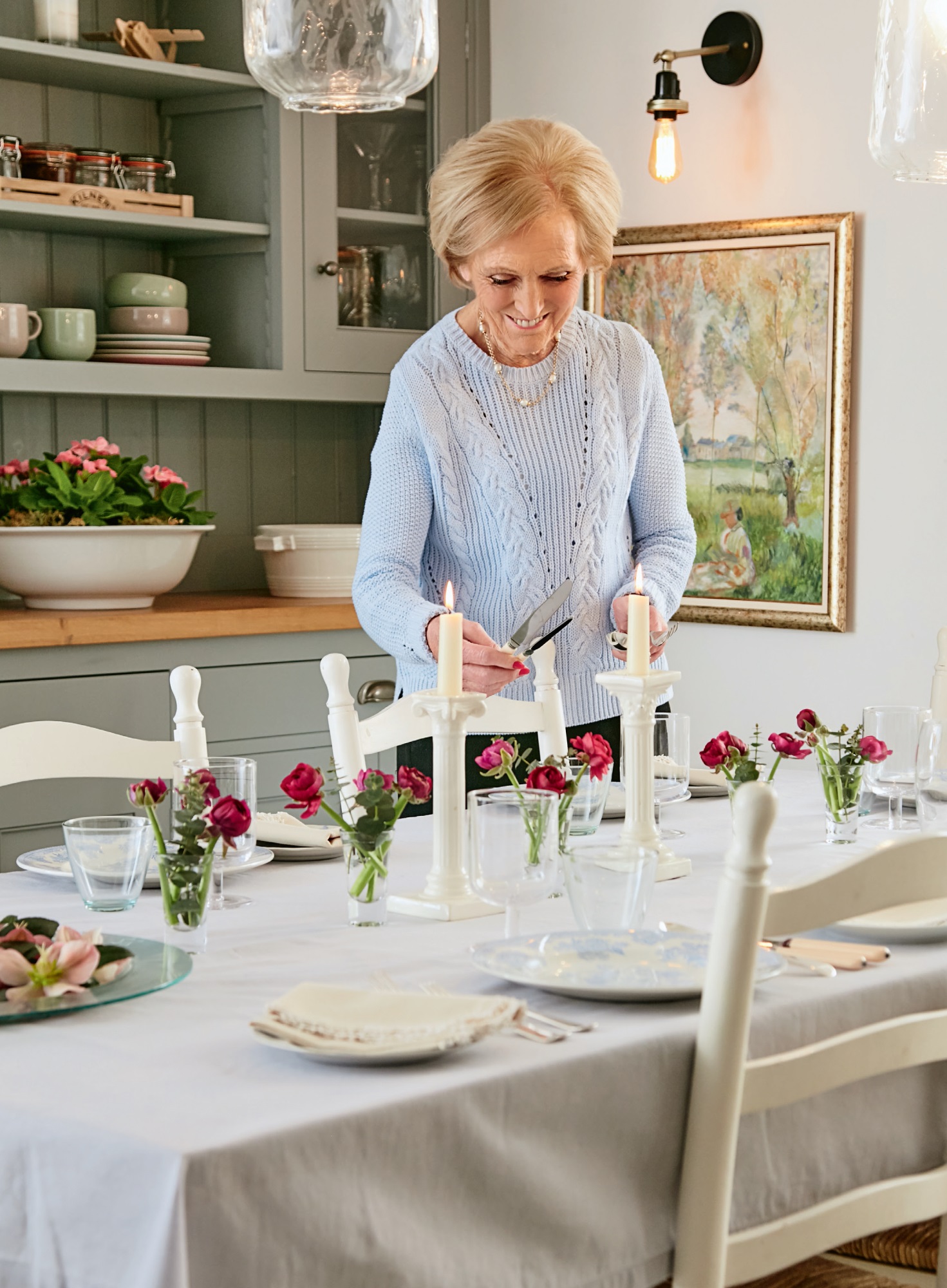 Mary setting a table for a party featured in Hall featuredMary’s Household Tips & Tricks is published on 5th October 2017 by Michael Joseph, Hardback, £20.00. (Georgia Glynn Smith/Michael Joseph/PA) 