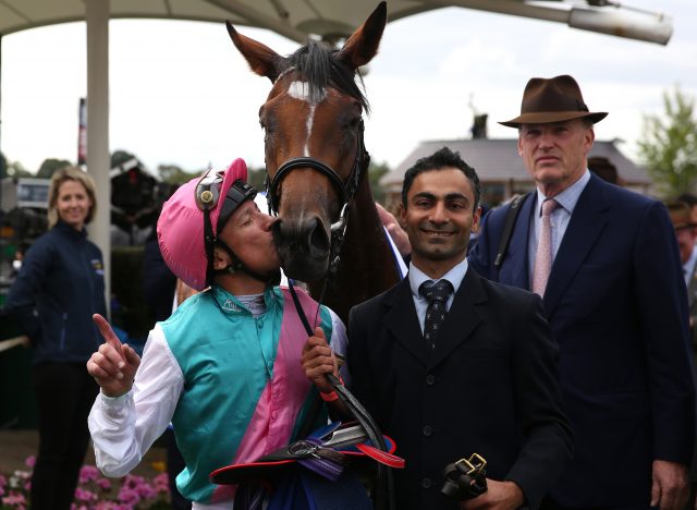 Dettori kisses Enable after winning the winning the Yorkshire Oaks