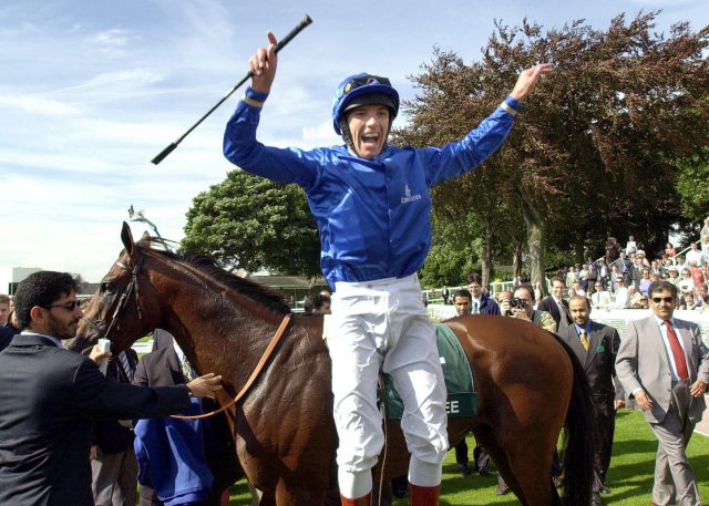 Dettori leaps off Sakhee after winning the Juddmonte International at York 