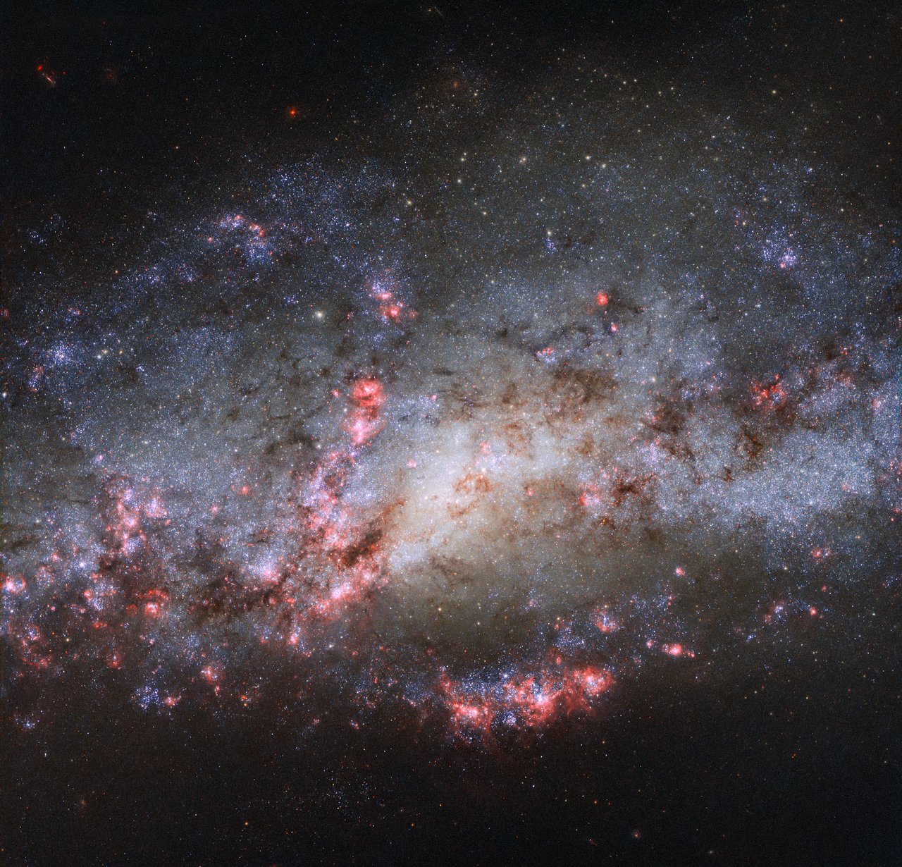 This image of two colliding galaxies shows what a real starburst looks ...