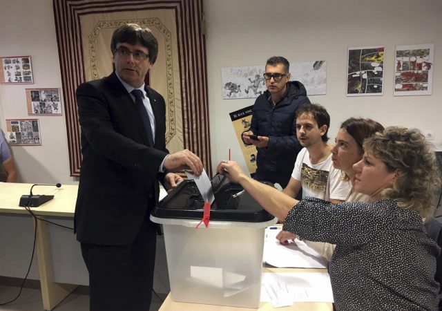 Catalan President Carles Puigdemont casts his ballot